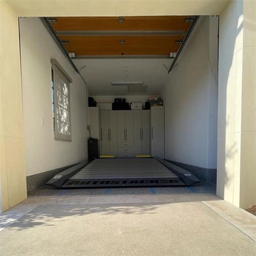 Autostacker Parking lift with a standard 6,000-pound capacity, equipped with a standard console including a power unit, operating on 110V, 50/60HZ, and 1-Phase power supply